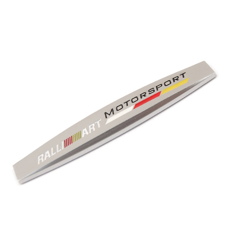 Эмблема трехмерная металлическая Ralliart 98*18 мм