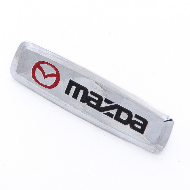 Шильдик Mazda для ковров и органайзеров