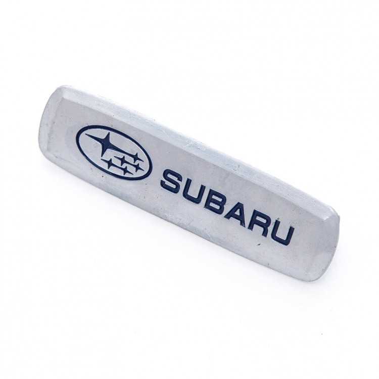 Шильдик Subaru для ковров и органайзеров